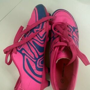 Pink soccer cleats